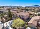 Aerial view of a two story home with a well maintained yard at 853 Ashford Way, Henderson, NV 89015