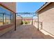 Private back patio with stonework flooring, large picture window, and pergola frame at 853 Ashford Way, Henderson, NV 89015