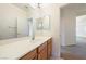 Bathroom featuring a spacious vanity and bright mirror at 853 Ashford Way, Henderson, NV 89015