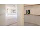 Bright bedroom with a large window and neutral carpeting, with a walk-in closet at 853 Ashford Way, Henderson, NV 89015
