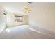 Bright bedroom with carpet, two windows providing natural light, and ample space for personalization at 853 Ashford Way, Henderson, NV 89015
