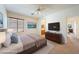Tastefully decorated bedroom with an en-suite bathroom and carpet flooring at 853 Ashford Way, Henderson, NV 89015