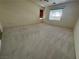 Large bedroom with carpet, natural light, and ample space for flexible furniture arrangements at 853 Ashford Way, Henderson, NV 89015