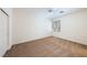 Clean bedroom featuring a ceiling fan, window, and closet at 853 Ashford Way, Henderson, NV 89015