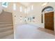 Bright living room features tall ceilings and multiple windows at 853 Ashford Way, Henderson, NV 89015
