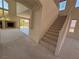 Bright living room with fireplace and access to the backyard at 853 Ashford Way, Henderson, NV 89015