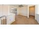 Open loft area with carpet flooring and natural light at 853 Ashford Way, Henderson, NV 89015