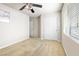 Bright bedroom with neutral carpet, ceiling fan, and a closet at 9539 Iris Flat Ct, Las Vegas, NV 89178