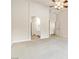 Comfortable main bedroom with carpet, ceiling fan, and ensuite bath access at 9539 Iris Flat Ct, Las Vegas, NV 89178