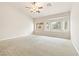 Large main bedroom with ample natural light and plush carpeting at 9539 Iris Flat Ct, Las Vegas, NV 89178