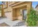 Front entrance with a decorative door and a well-maintained walkway at 9651 Bouncing Ball St, Las Vegas, NV 89178