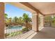 A beautiful balcony view showcases the sparkling pool and palm trees at 2285 Villefort Ct, Las Vegas, NV 89117