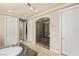 The luxury bathroom includes a spacious shower with a built-in bench and neutral tile at 2285 Villefort Ct, Las Vegas, NV 89117