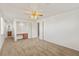 Spacious carpeted bedroom with ceiling fan and built-in desk at 2285 Villefort Ct, Las Vegas, NV 89117