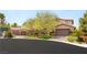 Beautiful home featuring a brick driveway leading to a three-car garage at 2285 Villefort Ct, Las Vegas, NV 89117