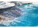 Beautiful rock waterfall cascading into a refreshing pool, creating a tranquil oasis at 2285 Villefort Ct, Las Vegas, NV 89117