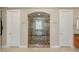 This luxury shower is enclosed in glass and features dual shower heads and a bench at 2285 Villefort Ct, Las Vegas, NV 89117