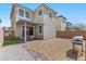 A backyard has an outdoor dining area with a barbecue at 2293 Teatro Ave, Henderson, NV 89044