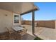 Covered patio area offering outdoor seating with a grill at 2293 Teatro Ave, Henderson, NV 89044