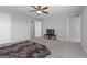 This spacious bedroom boasts a neutral color scheme and comfortable carpet flooring at 2293 Teatro Ave, Henderson, NV 89044