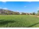 Expansive green space in a residential community, showcasing well-maintained lawns at 2293 Teatro Ave, Henderson, NV 89044