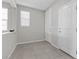 Open landing area with tile flooring, natural light, and multiple doorways at 2293 Teatro Ave, Henderson, NV 89044