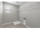 Practical laundry room with tile floors and hookups at 2293 Teatro Ave, Henderson, NV 89044