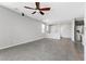 Spacious living room with tile floors, adjacent to kitchen with modern finishes at 2293 Teatro Ave, Henderson, NV 89044