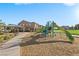 Community playground and picnic area provide outdoor enjoyment near attractive, Gathering-friendly townhomes at 2293 Teatro Ave, Henderson, NV 89044