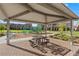 Shaded picnic area and playground in a Gathering-friendly community at 2293 Teatro Ave, Henderson, NV 89044