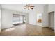Large bedroom with wood floors, sliding glass doors to the pool area and an ensuite bath at 315 Barletta Ave, Las Vegas, NV 89123