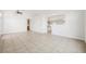 Bright living room with tile flooring open to the kitchen area at 315 Barletta Ave, Las Vegas, NV 89123