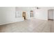 Spacious living room with tile flooring, ceiling fan, and view of entry at 315 Barletta Ave, Las Vegas, NV 89123