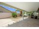 Backyard with covered patio, built-in barbecue, and low-maintenance landscaping for relaxing outdoor living at 315 Barletta Ave, Las Vegas, NV 89123
