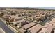 An aerial view of a large residential neighborhood with similar style homes and desert landscaping at 7137 Flowering Rose Ave, Las Vegas, NV 89117
