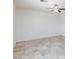 Bright room with tile flooring, ceiling fan, and fresh paint ready to personalize at 7137 Flowering Rose Ave, Las Vegas, NV 89117