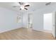 Bright bedroom with connecting bathroom, and a modern ceiling fan at 7137 Flowering Rose Ave, Las Vegas, NV 89117