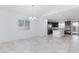 Bright kitchen featuring modern appliances, granite countertops, and a center island at 7137 Flowering Rose Ave, Las Vegas, NV 89117