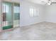 Bright room featuring sliding glass door that leads to the backyard area at 7137 Flowering Rose Ave, Las Vegas, NV 89117