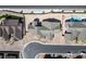 Aerial view of a home showing the roof, backyard, and surrounding neighborhood at 8863 Italian Trotter Ct, Las Vegas, NV 89113