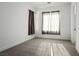 Bright bedroom with neutral carpet, natural light, and a view from the window at 8863 Italian Trotter Ct, Las Vegas, NV 89113