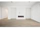 Open living space with hard flooring and modern fireplace adding character and warmth to the room at 8863 Italian Trotter Ct, Las Vegas, NV 89113