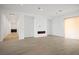 Spacious living room with hard flooring and modern fireplace feature creates a cozy and stylish ambiance at 8863 Italian Trotter Ct, Las Vegas, NV 89113