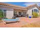 Backyard features a brick patio and outdoor furniture, perfect for relaxing at 90 Ancient Hills Ln, Henderson, NV 89074