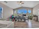 Bright dining area with lots of natural light, a ceiling fan, and room for entertaining at 90 Ancient Hills Ln, Henderson, NV 89074