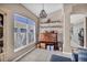 Dining area featuring a piano with high ceilings and a modern light fixture at 90 Ancient Hills Ln, Henderson, NV 89074