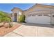 Beautiful curb appeal, large three car garage, and mature landscaping give this home a great presence at 90 Ancient Hills Ln, Henderson, NV 89074