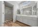 Bathroom features double vanity, large mirror, and a separate shower at 9917 Arbuckle Dr, Las Vegas, NV 89134
