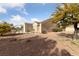 House exterior featuring desert landscaping at 9917 Arbuckle Dr, Las Vegas, NV 89134
