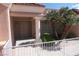 Charming front porch with desert landscaping, and a tiled roof offering curb appeal at 9917 Arbuckle Dr, Las Vegas, NV 89134